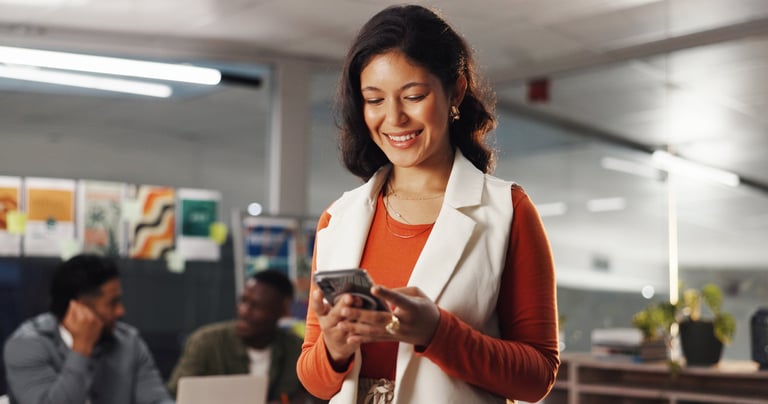 Smile, phone and reading with business woman in office for social media manager, communication and research. Online branding, networking and marketing campaign with person in creative agency for web